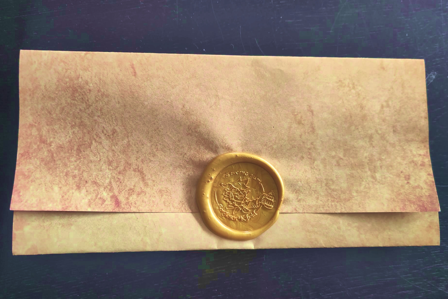 Papiergutschein mit Wachssiegel